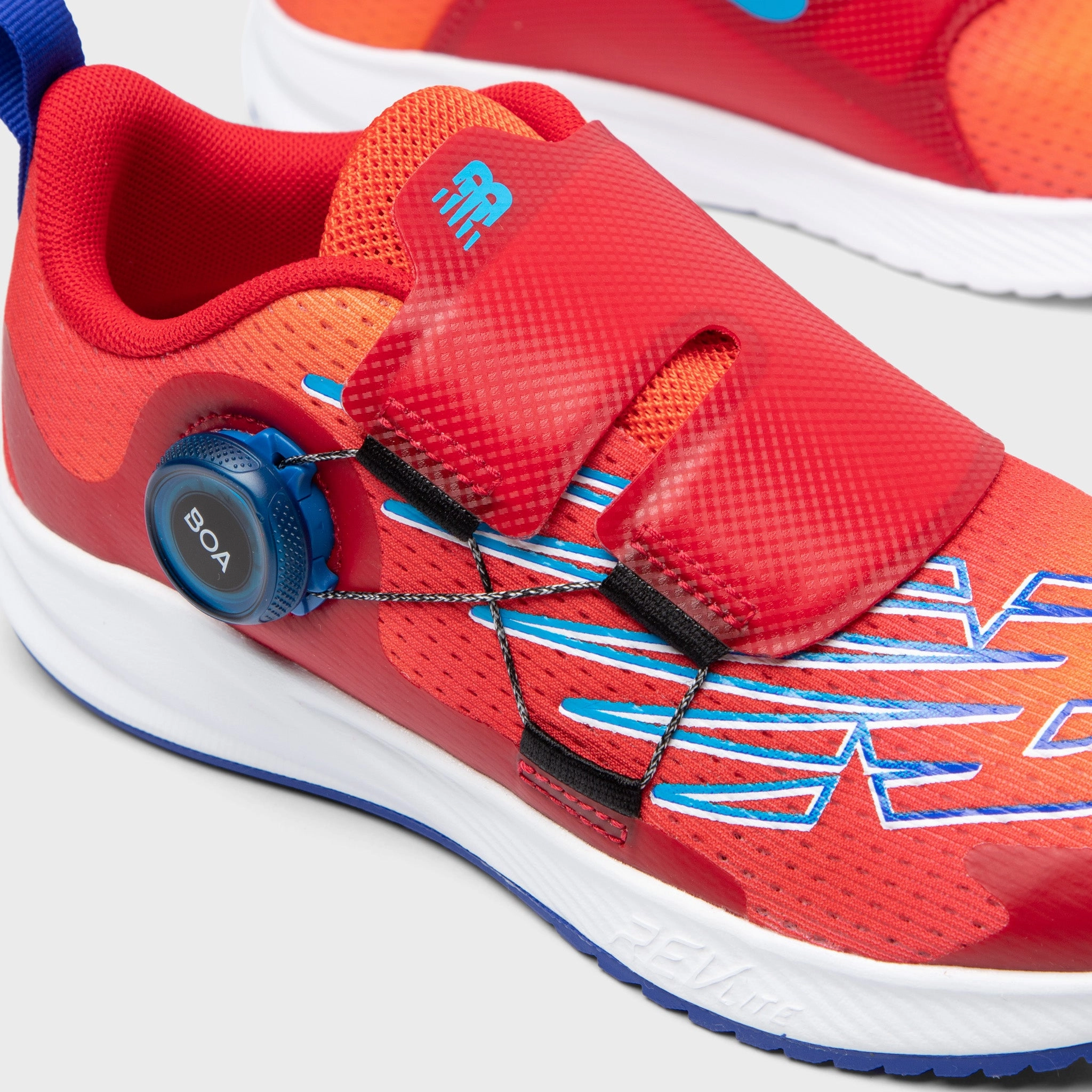 New Balance Juniors' Fuelcore Reveal Boa Neo Flame / Team Red - Infinity Blue